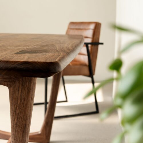 Modern walnut dining table with custom base